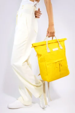 Medium Hackney Sustainable Backpack – Tuscan Sun Yellow -Household Decoration Shop backpack medium hackney tuscan sun yellow cut out lifestyle image kind bags
